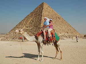 David and Beverly on a camel at the pyramids in Cairo.